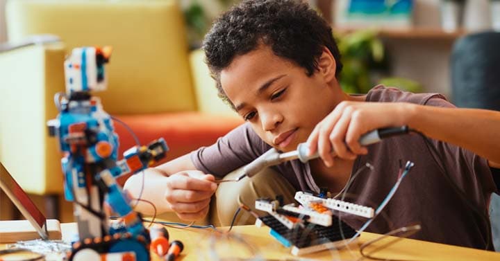 Middle school student engaging in a hands-on school activity - Connections Academy
