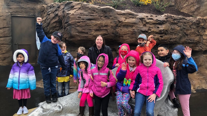 A group of students and their teacher on a field trip - Connections Academy