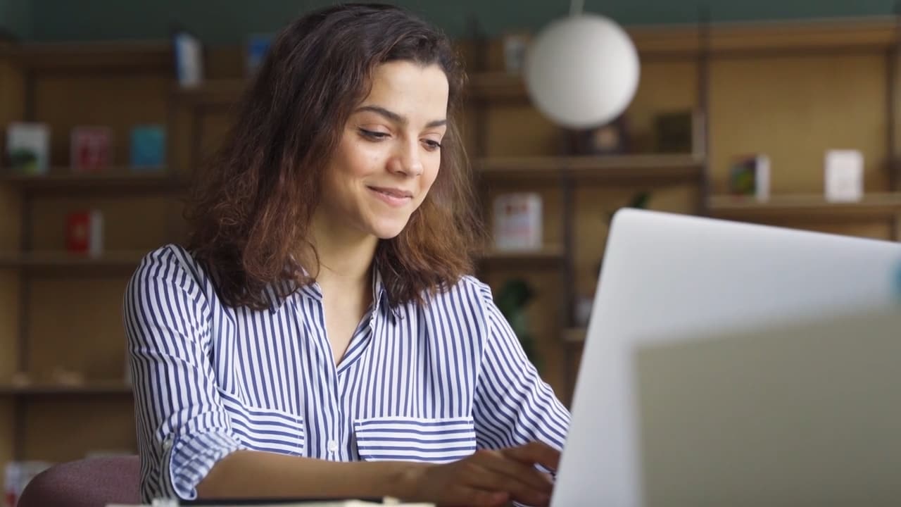 A student studying on her laptop at Connections Academy