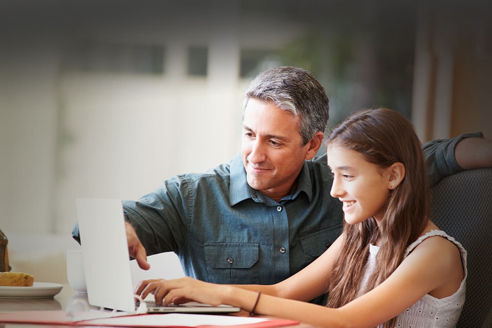 Father Learning Coach and daugther are taking an Arizona Connections Academy class online.