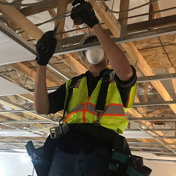 Connections Academy student Neil working as an electrical contractor.