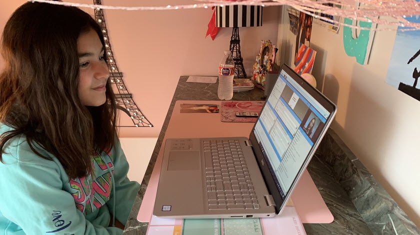 Young female student in LiveLesson session online - Connections Academy